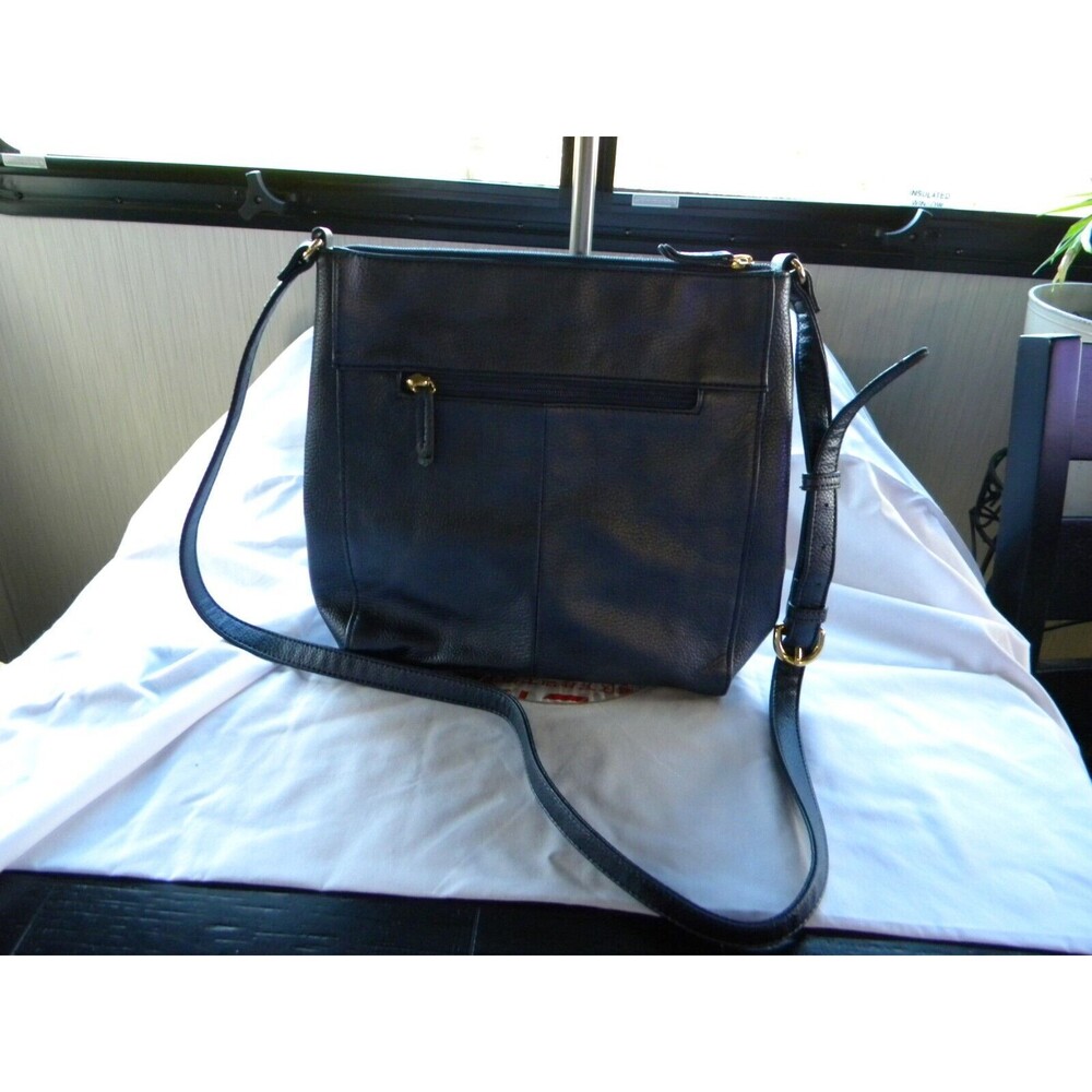 Tignanello Black Crossbody Bag Buckle snap pocket in the front, w/RFID card